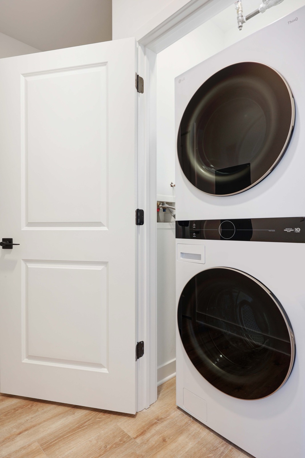 In-unit LG stacked washer and dryer in a two-bedroom apartment at The Arthur Carteret NJ