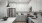 a kitchen with white cabinets