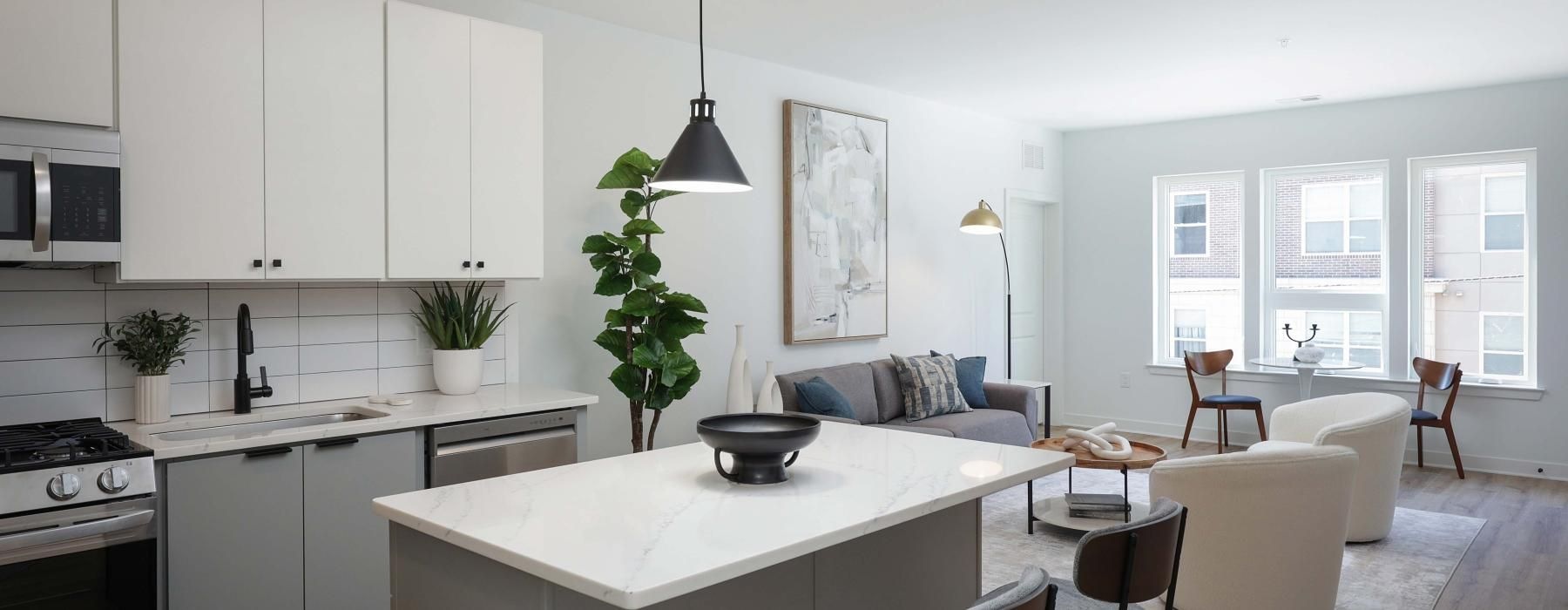 a kitchen with white cabinets