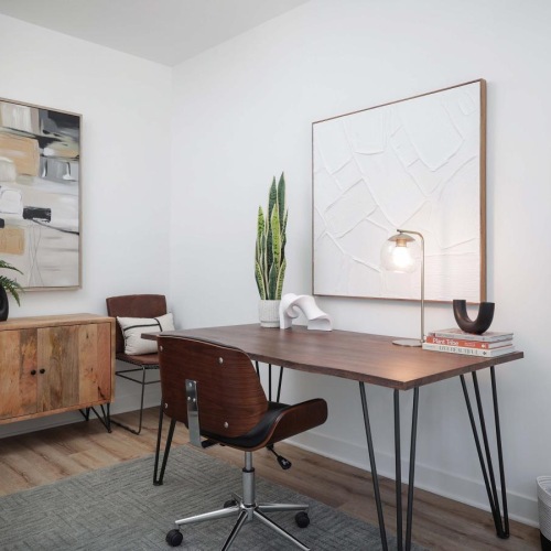 a room with a table and chairs