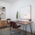 a room with a table and chairs